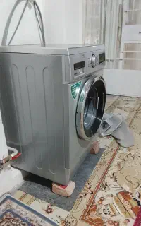 ماشین لباسشویی تمیز بدون هیچ ایرادی در حد نو
