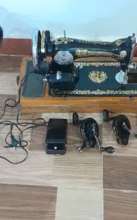 چرخ خیاطی دستی مرد پرنده با یک دسته چرخ اضافه