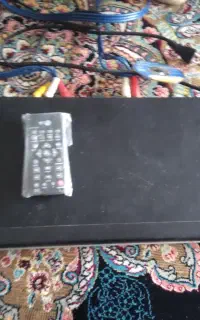 دستگاه دی وی دی و سی دی خور و هدفون
