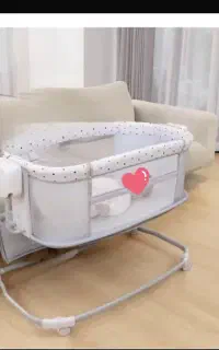 تخت  گهواره  کنار مادر برقی موزیکال