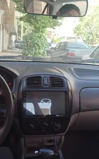 مزدا 323 اتومات سفید 2006