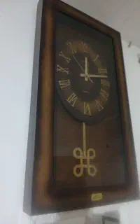 ساعت دیواری چوبی آرتا