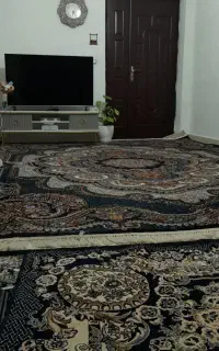 یک عدد قالی 12متری با میز تی وی