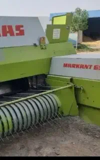 خدمات بسته بندی یونجه وکولور با بیلر