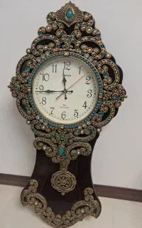 ساعت دیواری آونگ دار