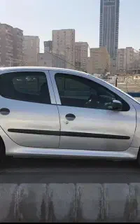 206 نقره ای تیپ 5 مدل 94