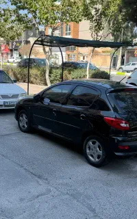 پژو۲۰۷ مشکی سقف شیشه