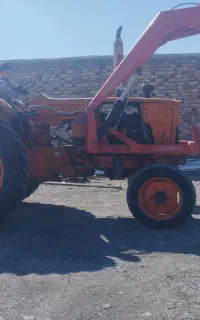کار کردن با تراکتور بیل