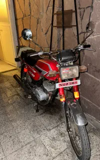 سوزوکی ax100