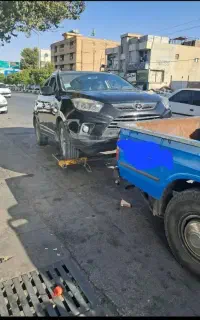 یدک کش همراه با چرخگیر. خودروبر.چرخ گیر