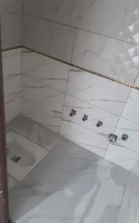اجرای کاشیکاری سرویس ها و آشپزخانه