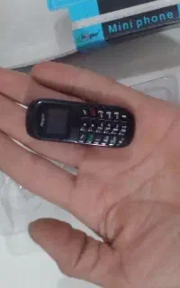 گوشی موبایل و هندزفری بلوتوثی