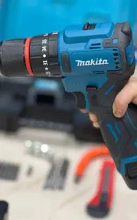دریل شارژی ماکیتا چکشی براشلس ابزار فرزین