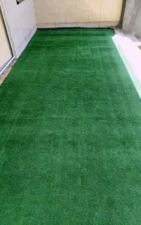 فروش چمن مصنوعی نو عرض ۲ متر .طول ۴ متر  درجه ۱