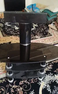 زیر تلویزیونی شیشه ای