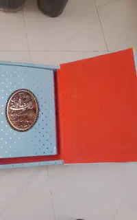 یک جلد  کتاب قرآن مجید