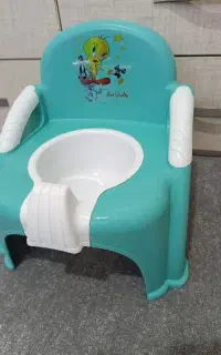 قصری کودک. صندلی توالت کودک