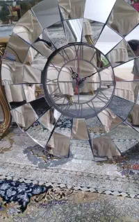 ساعت دیواری اینه ای