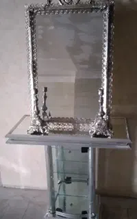 آینه وشعمدان وساعت