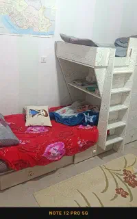 تخت دوطبقه با کمد و کشو
