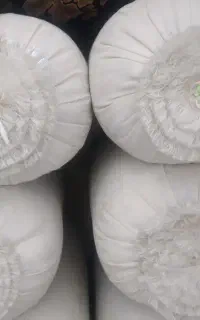 دوازده عدد پشتی غلطکی با گل بالشت سفید