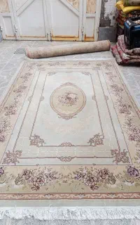 یک جفت فرش 6متری و ده تخته فرش 12و 9و کناره