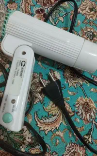 سشوار و ساعت و کیف پول