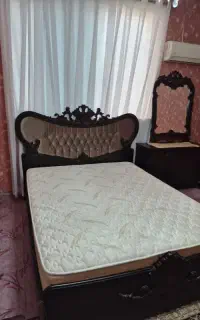تختخواب دو نفره به همراه آینه و دراور و تشک