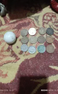 سکه 50ریالی دهه 60و50ویکعدد سنگ الماس آسیاب