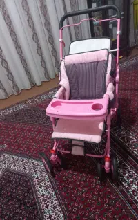 کالسکه دخترانه صورتی