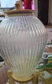 دو عدد جا شمعی و دو دسته گل وکلمن شربتی ودکور