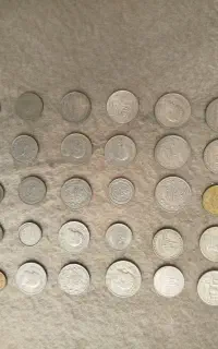 تعدادی سکه ی جمهوری اسلامی و پهلوی