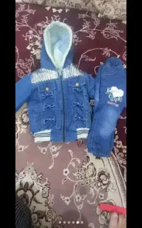 لباس بچه و سه چرخه