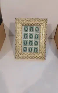 تمبروسکه  قاب خاتم کاری شده همراه ۱۲ عدد تمبر شاهی