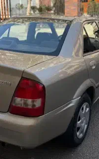 مزدا 323 مشابه صفر بدون رنگ