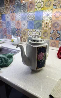 قوری چینی برقی