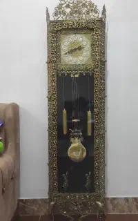 ساعت برنز اسیتاده