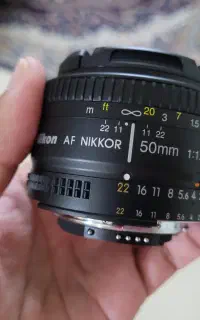 لنز نیکون 50 f1.8 D مشابه آکبند