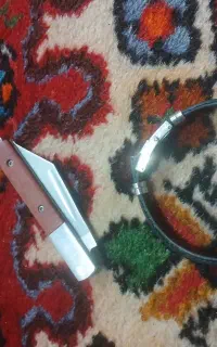 چاقو و ۱عدد دست بند