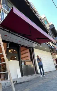 سایبان مغازه بازویی فنری برقی نیم کره دستی ثابت
