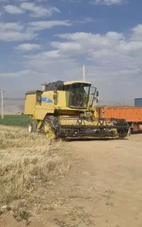 کمباین نیوهلندtc56مدل2006تمیز