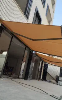 سایبان بازویی پارچه ای متحرک دستی برقی و چتر