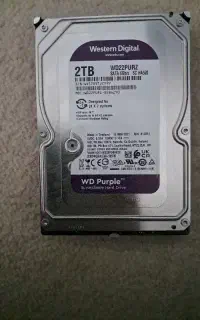 هارد دو ترابایت  wd purple  و سیگیت