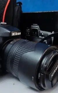دوربین nikon d7100 و لنز 140-18 mm