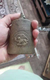 زنگوله شیر و خورشید