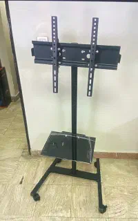 استند ایستاده ۳۲تا ۱۰۰ اینچ همراه با شلف