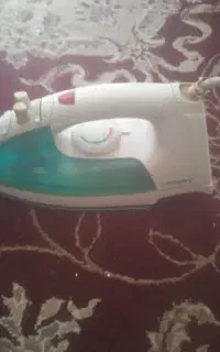 اتو برقی تمیز