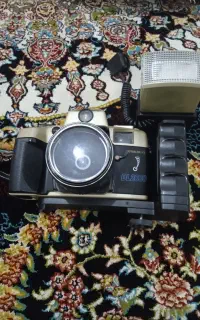 دوربین عکاسی نوه دست نخورده سالم سالم کیفشم است