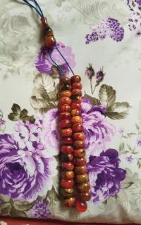 کهربا پرچمی رگه دار خوش رنگ