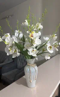 گل ارکیده با گلدان زیبا